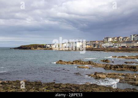 12 May 2022, The seafront and promenade in the popular tourist centre of Portstewart on the Causeway Coast of County Londonderry in Northern Ireland Stock Photo