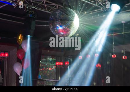 disco mirror ball. Abstract background from a night club. party lights disco ball. Stock Photo