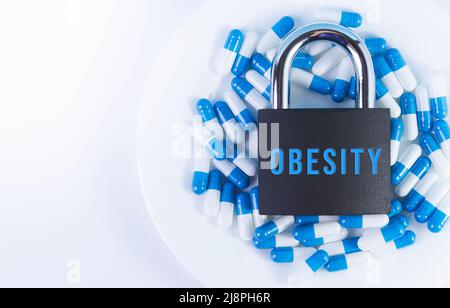 The prohibition of taking drugs for weight loss. Restriction on the import of weight loss pills. Closing medications. Contraindications for treatment. Stock Photo