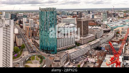 BIRMINGHAM, UK - MAY 10, 2022.  An aerial view of Birmingham cityscape skyline with The Radisson Blu hotel skyscraper in the foreground Stock Photo