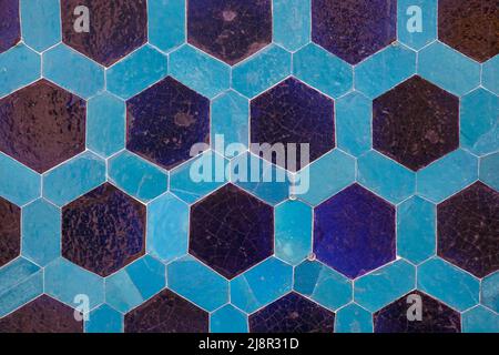 Hexagonal colorful modern bathroom, toilette or kitchen ceramic tiles wall. Artistic blue and white ornamental hexagonal ceramic tiles texture pattern Stock Photo