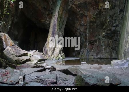 Cathedral cave cavern in old slate quarry, Little Langdale, Cumbria, England, UK Stock Photo