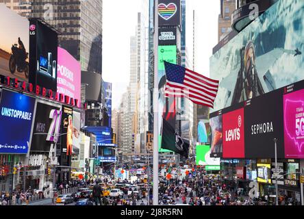New York, USA. 17th May, 2022. A U.S. flag is seen on Times Square in New York, the United States, May 17, 2022. Credit: Wang Ying/Xinhua/Alamy Live News Stock Photo