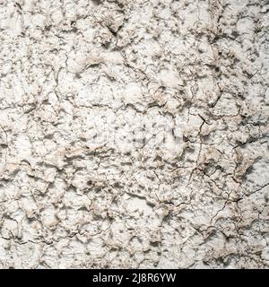 The wall is covered with gray decorative plaster Stock Photo