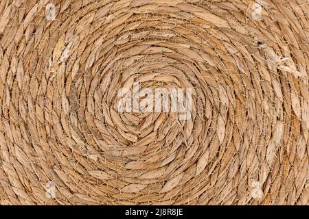 Close up of round weave wicker basket pattern background Stock Photo