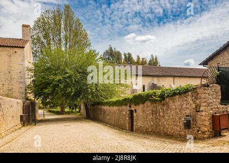 Priverno, Latina, Lazio, Italy - The Fossanova Abbey. The ancient buildings of the small medieval village built around the monastery. The cobblestone Stock Photo