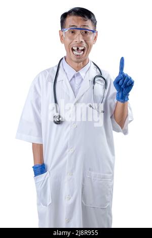 Asian nerd scientist with a stethoscope standing and pointing something isolated over white background Stock Photo