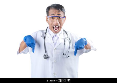 Asian nerd scientist with a stethoscope standing and pointing something isolated over white background Stock Photo