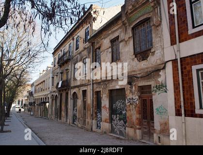 Shabby facades of old townhouses, along the Paco da Rainha, in the Arroios district, Lisbon, Portugal Stock Photo