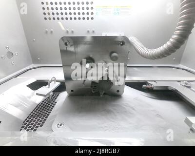 Platform with Objects Printed From Metal Powder Stands in Working Chamber Inside Stock Photo