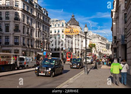 London, UK - Nov 05, 2012: Regent Street decorated with Christmas ornaments way before the holiday Stock Photo