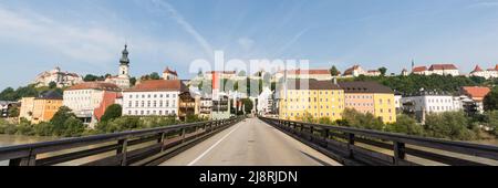 Burghausen, Germany - July 24, 2021: Panorama of Burghausen. With historical buildings, church St. Jakob and the medieval castle. In the foreground a Stock Photo