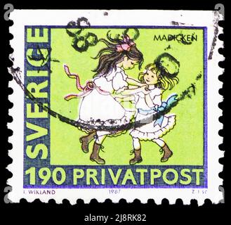 MOSCOW, RUSSIA - MAY 14, 2022: Postage stamp printed in Sweden shows Girls dancing (Madicken), Rebate Stamps - 80th birthday of Astrid Lindgren serie, Stock Photo