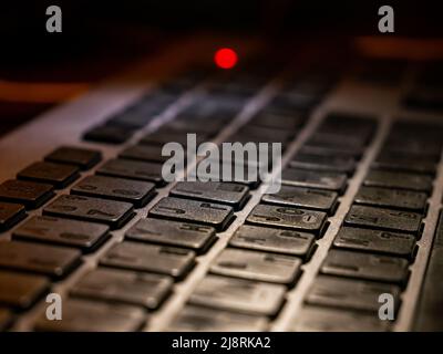Backlit keyboard, grey color pc close up Stock Photo