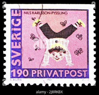 MOSCOW, RUSSIA - MAY 14, 2022: Postage stamp printed in Sweden shows Boy doing handstand (Nils Karlsson-Pyssling), Rebate Stamps - 80th birthday of As Stock Photo