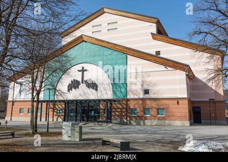 Oberammergau, Germany - Feb 26, 2021: View on the main entrance of the Passionstheater Oberammergau. Home of the historical passion play. Stock Photo