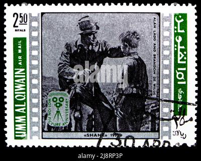 MOSCOW, RUSSIA - MAY 14, 2022: Postage stamp printed in Umm al-Qiwain shows Alan Ladd , Brandon de Wilde, Screen actors serie, circa 1969 Stock Photo