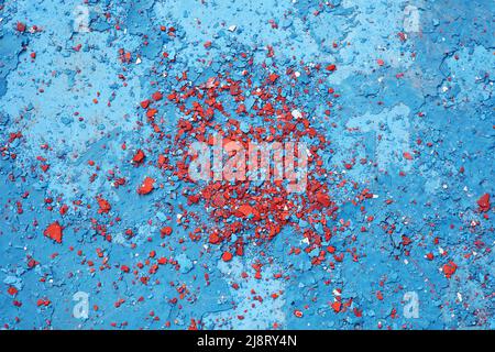 Colorful paint peeling on stone wall Stock Photo