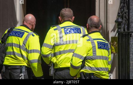 Downing Street, London, UK. 18 May 2022. Met police motorbike riders arrive in 10 Downing Street before escorting Boris Johnson to PMQs. Credit: Malcolm Park/Alamy Live News. Stock Photo