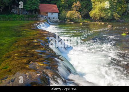 A watermill on the cascades of the Dobra River in Croatia Stock Photo