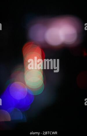 The colorful light bulb in the dark Stock Photo