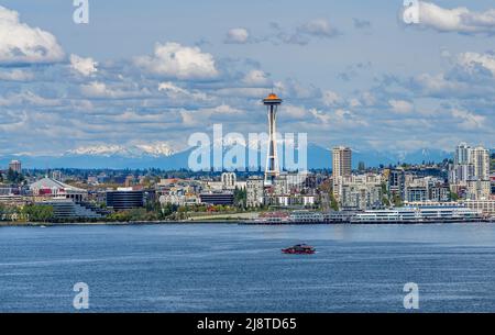 Cascade Mountain can be seen behind the Seattle skyline in Washington State. Stock Photo