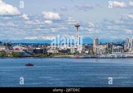 Cascade Mountain can be seen behind the Seattle skyline in Washington State. Stock Photo