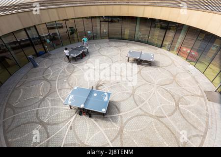 Two men playing table tennis, The Library of Birmingham, UK Stock Photo