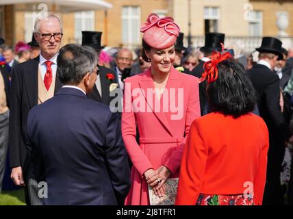 The Duchess of Cambridge speaks to guests attending a Royal Garden Party at Buckingham Palace in London. Picture date: Wednesday May 18, 2022. Stock Photo