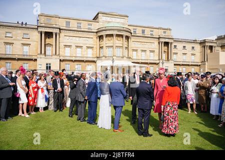 The Duchess of Cambridge speaks to guests attending a Royal Garden Party at Buckingham Palace in London. Picture date: Wednesday May 18, 2022. Stock Photo