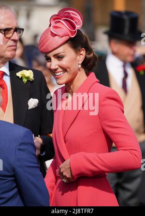 The Duchess of Cambridge speaks to guests attending a Royal Garden Party at Buckingham Palace in London. Picture date: Wednesday May 18, 2022. Stock Photo