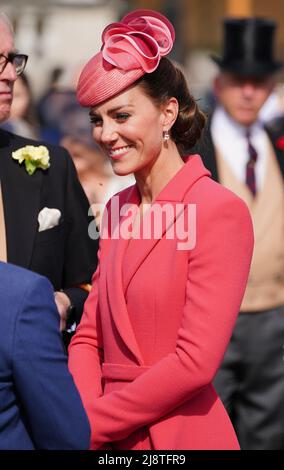 The Duchess of Cambridge speaks to guests attending a Royal Garden Party at Buckingham Palace in London. Picture date: Wednesday May 18, 2022. Stock Photo