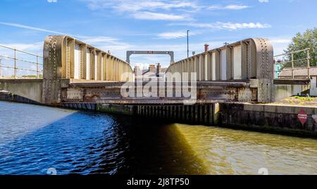 North Junction Lock Bridge swinging open to allow boats to pass between Cumberland Basin and the Floating Harbour in Bristol UK Stock Photo