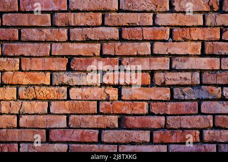 Background is wall old red burnt brick Stock Photo