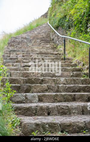 Totnes.Devon.United Kingdom.August 8th 2021.The stairway leading to the top of Totnes castle in Devon Stock Photo