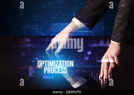 Businessman touching huge screen concept Stock Photo