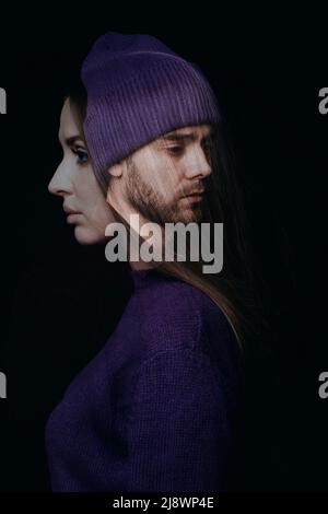 Double exposure photo of sad bearded man in violet hat and beautiful long-haired woman in violet sweater on dark background Stock Photo
