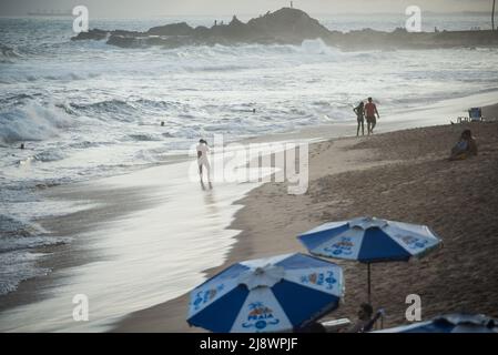 Groups of people at Farol da Barra beach in Salvador city, Bahia state