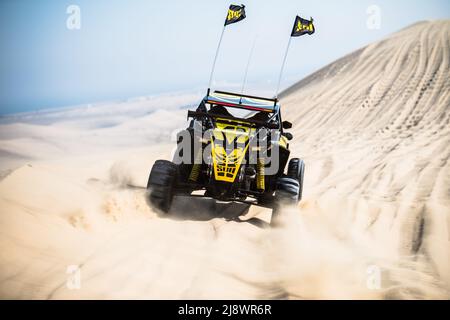 Doha, Qatar, February 23, 2018: Off road buggy car in the sand dunes of the Qatari desert. Stock Photo