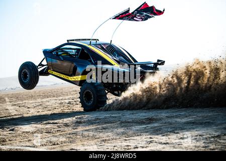 Doha, Qatar, February 23, 2018: Off road buggy car in the sand dunes of the Qatari desert. Stock Photo