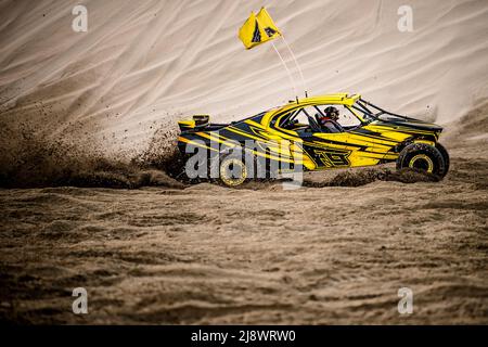 Doha, Qatar, February 23, 2018: Off road buggy car in the sand dunes of the Qatari desert. Stock Photo