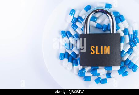 The prohibition of taking drugs for weight loss. Restriction on the import of weight loss pills. Closing medications. Contraindications for treatment. Stock Photo