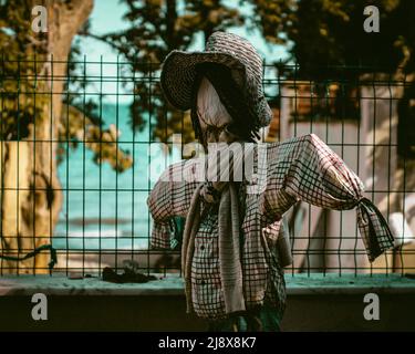 A scarecrow in the garden Stock Photo