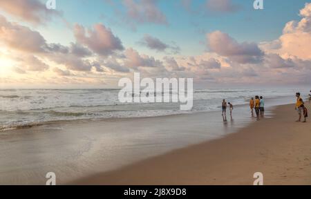 Sea beach at sunrise with moody sky at Puri, Odisha, India Stock Photo