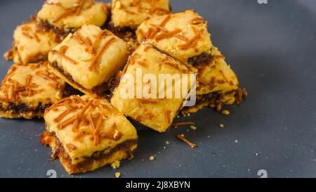 Pineapple cheese tart is a fusion from pineapple tart small, bite-size tart filled or topped with pineapple jam adding extra ingredient of cheese, com Stock Photo