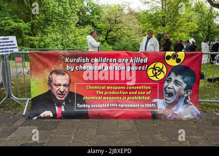 A banner illustrating the killing by chemical gases of Iraqi Kurdish children seen during the demonstration close to the Organisation for the Prohibition of Chemical Weapons (OPCW) building in The Hague, condemning the use of chemical weapons by Turkey. A delegation from Britain had intended to visit the Orgainisation for the Prohibition of Chemical Weapons (OPCW), in The Hague, today to press for action from the watchdog. Steve Sweeney, had spent more than a year documenting Turkey's alleged use of chemical weapons in Iraqi Kurdistan with findings that included testimonies from Kurdish villag Stock Photo
