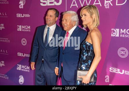 NEW YORK, NEW YORK - MAY 18: Dan Kraft, Robert Kraft and Dana Blumberg attend the 15th Annual Sports Business Awards at New York Marriott Marquis Hotel on May 18, 2022 in New York City. Credit: Ron Adar/Alamy Live News Stock Photo