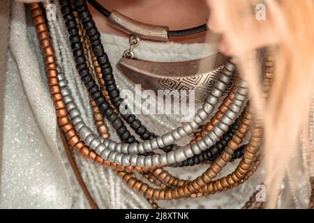 https://l450v.alamy.com/450v/2j8xtnk/close-up-of-beautiful-tribal-boho-style-woman-hands-with-lots-of-accessories-boho-style-for-fashionable-look-on-resort-middle-aged-well-looking-2j8xtnk.jpg