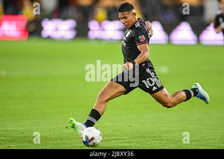 Washington, DC, USA. 18th May, 2022. D.C. United forward Ã‰dison Flores (10) kicks the ball during the MLS match between the New York City FC and the DC United at Audi Field in Washington, DC. Reggie Hildred/CSM/Alamy Live News Stock Photo