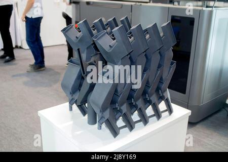 Black model internal combustion engine prototype printed on 3D printer. Object printed on 3D printer made from plastic close-up. 3D printed model. Prototype shape made by 3d printer. Symbol innovative Stock Photo